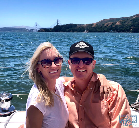 Photo of the two people on a boat now enhanced.