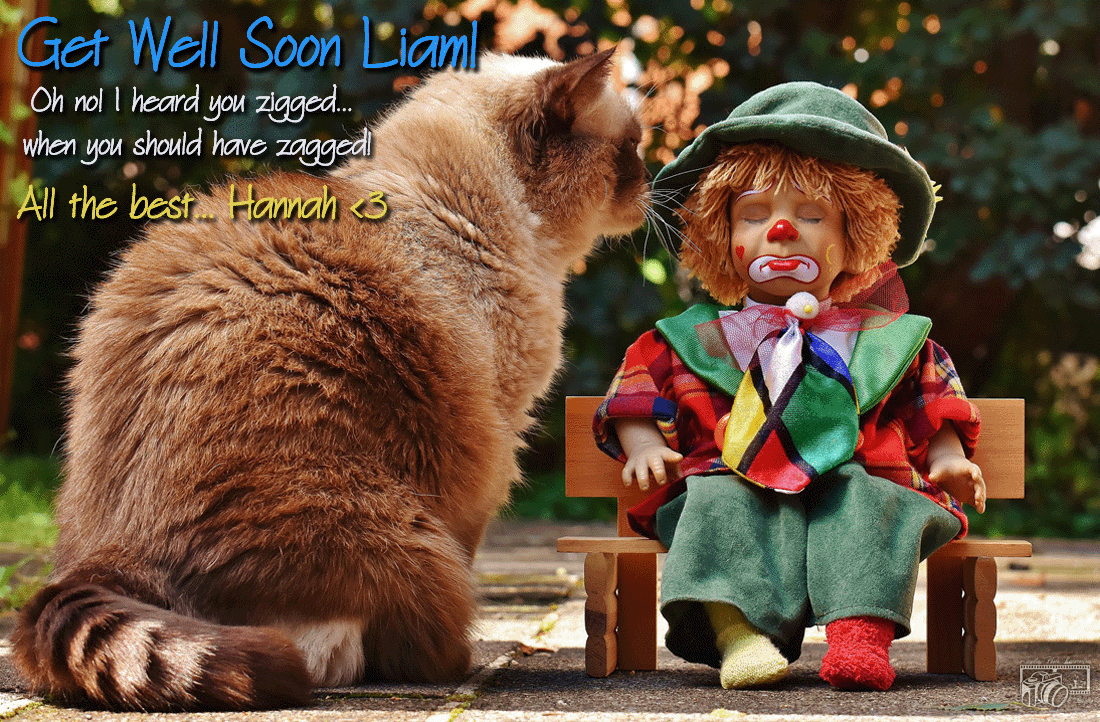 Image of an e-card with a sad-looking clown doll blinking.